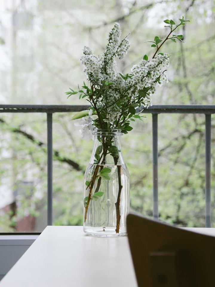 Meridian floor lamp casting a soft vertical light